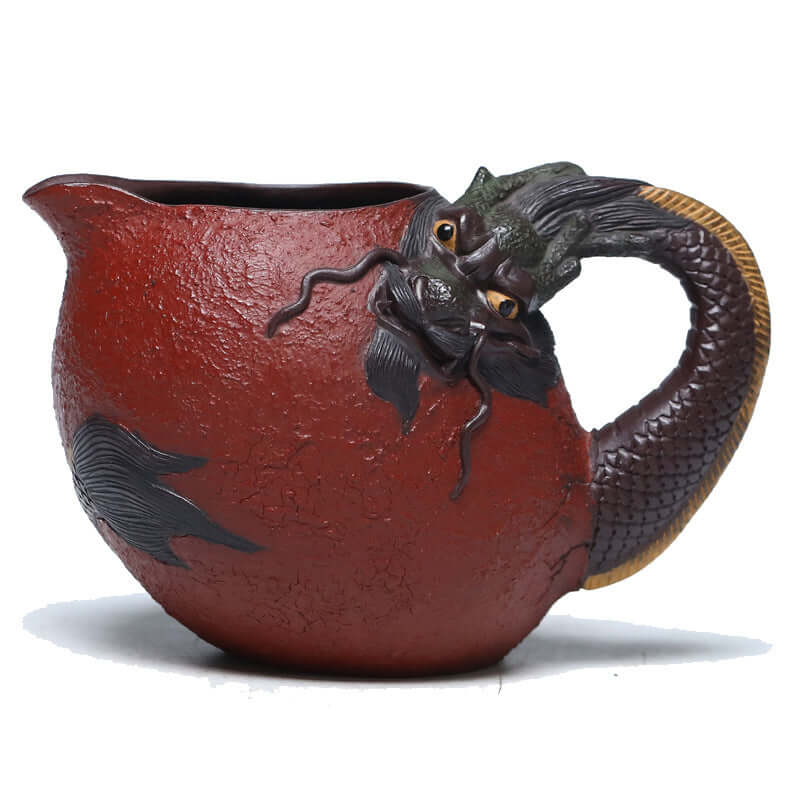 Handmade Yixing purple sand tea fair cup with dragon design, showcasing intricate craftsmanship and traditional style.
