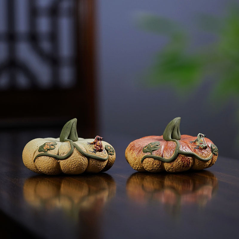 Handmade Yixing purple sand frog-themed pumpkin tea pet ornament for tea sets, ideal for gifting and bulk orders.