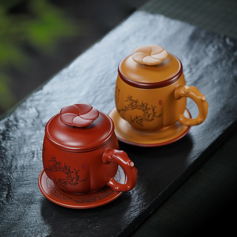 Handmade Yixing purple sand tea cups with plum blossom lids, showcasing original craftsmanship for tea enthusiasts.
