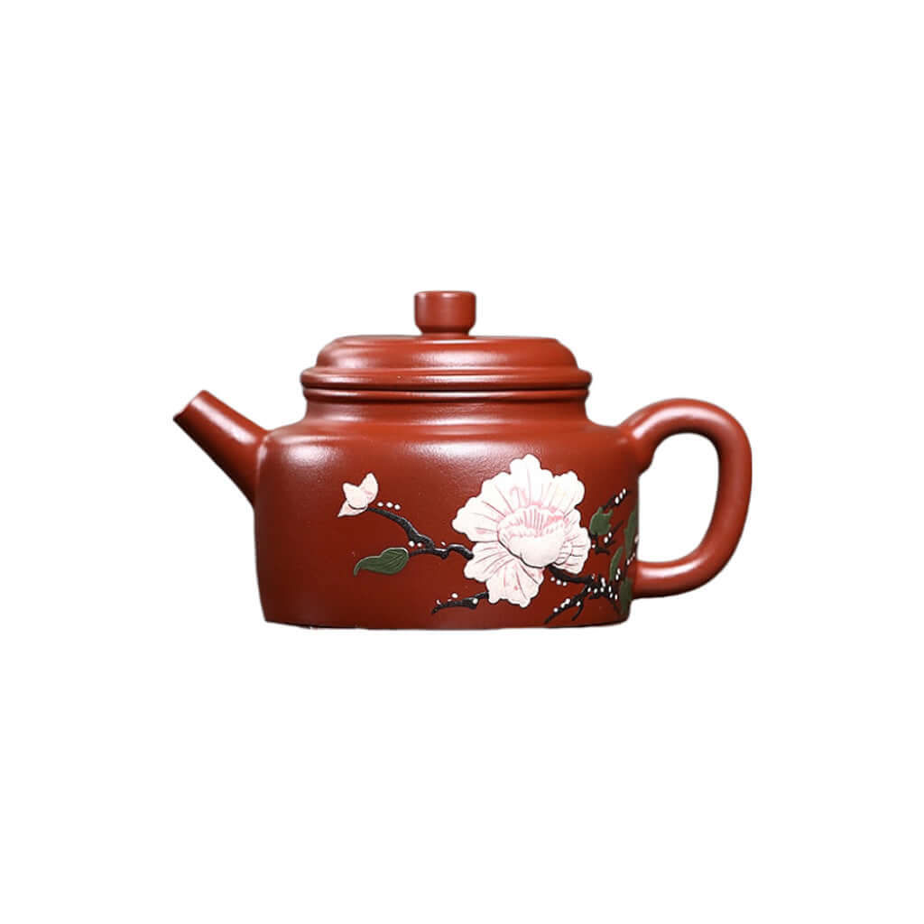 Handmade Yixing purple sand teapot with floral design, perfect for Kung Fu tea ceremonies.