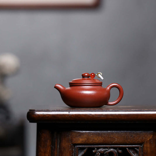 Handmade Yixing purple sand teapot with antique-style design, perfect for Kung Fu tea set, showcasing original craftsmanship.