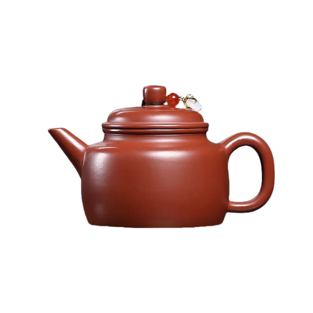 Handmade Yixing purple sand teapot with traditional design, perfect for Kung Fu tea ceremonies.