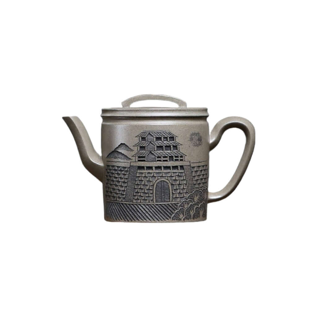 Handmade Yixing purple sand teapot with intricate castle design, perfect for Kung Fu tea ceremonies.