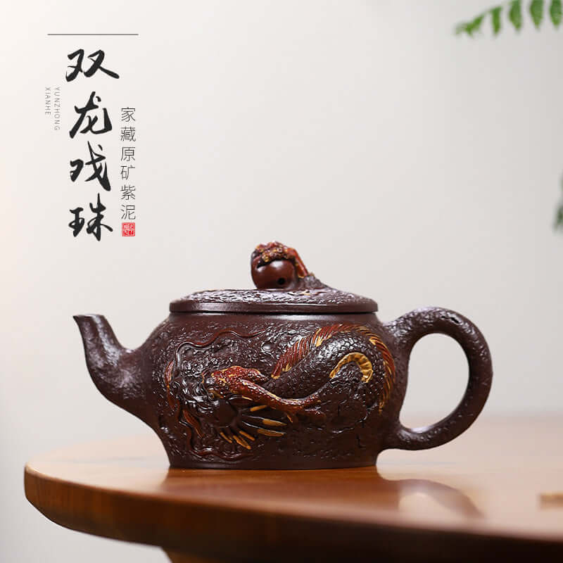 Handmade Yixing purple sand teapot with dragon design, showcasing intricate craftsmanship and artistic details.
