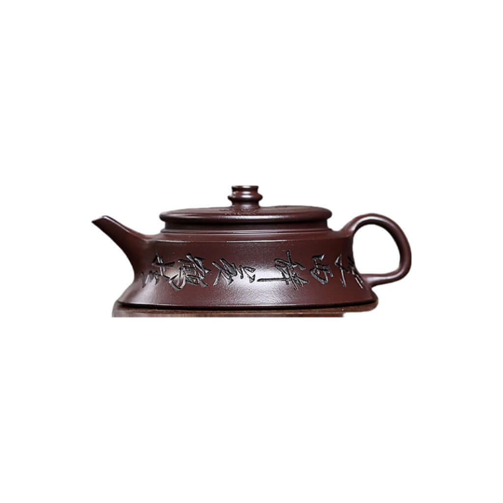 Handmade Yixing purple sand teapot with bamboo shadow design, ideal for home kung fu tea set.