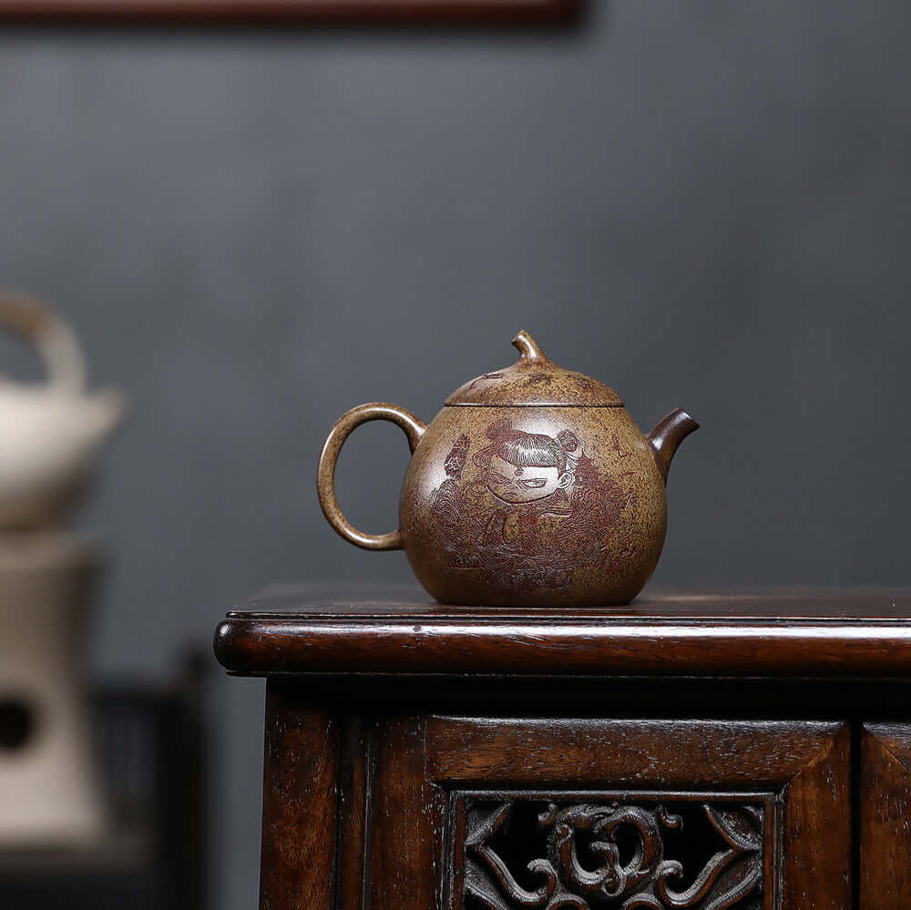 Handmade Yixing purple sand teapot with intricate design, perfect for Kung Fu tea brewing, showcasing original craftsmanship.