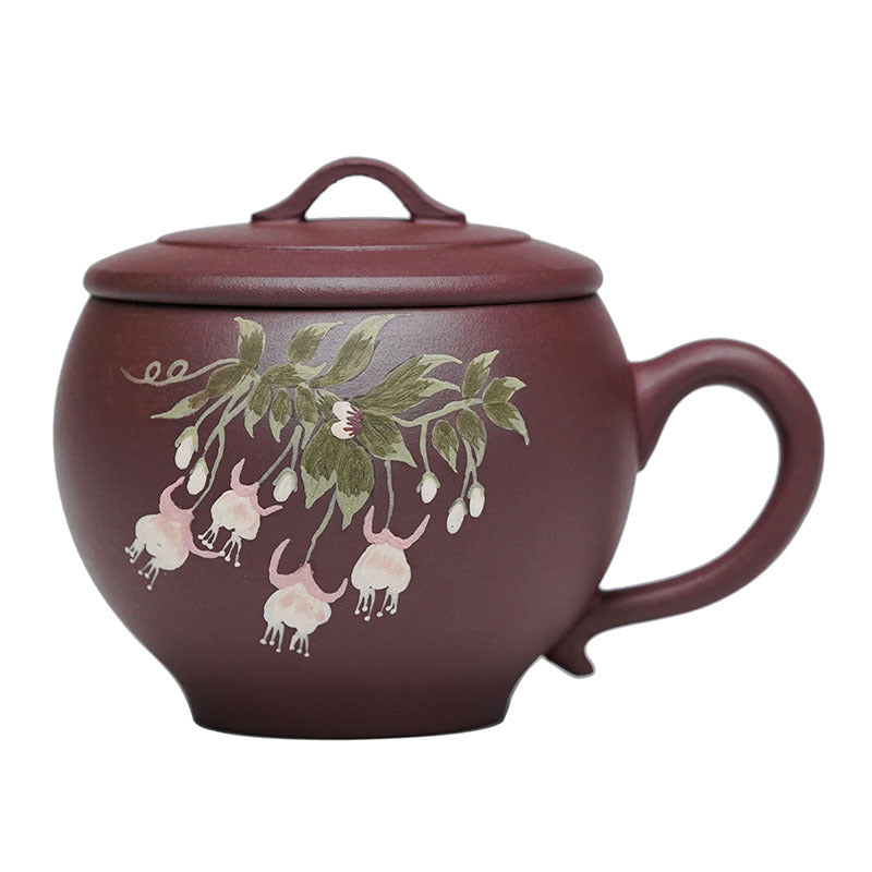 Handmade Yixing purple sand tea cup, original purple clay, featuring floral design, perfect for Kung Fu tea brewing.