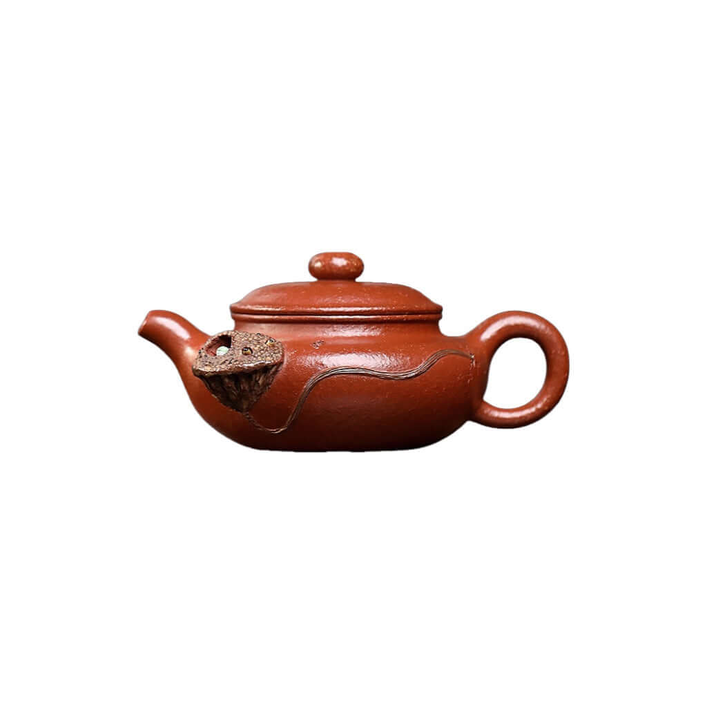 Handmade Yixing purple sand teapot made from raw ore red slope mud, showcasing antique craftsmanship in a kung fu tea set.