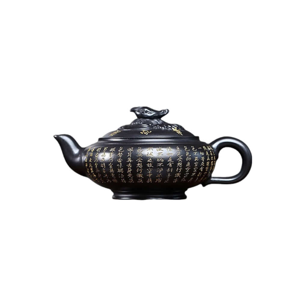 Handmade Yixing purple sand teapot with intricate carvings, ideal for home tea set and direct sales.