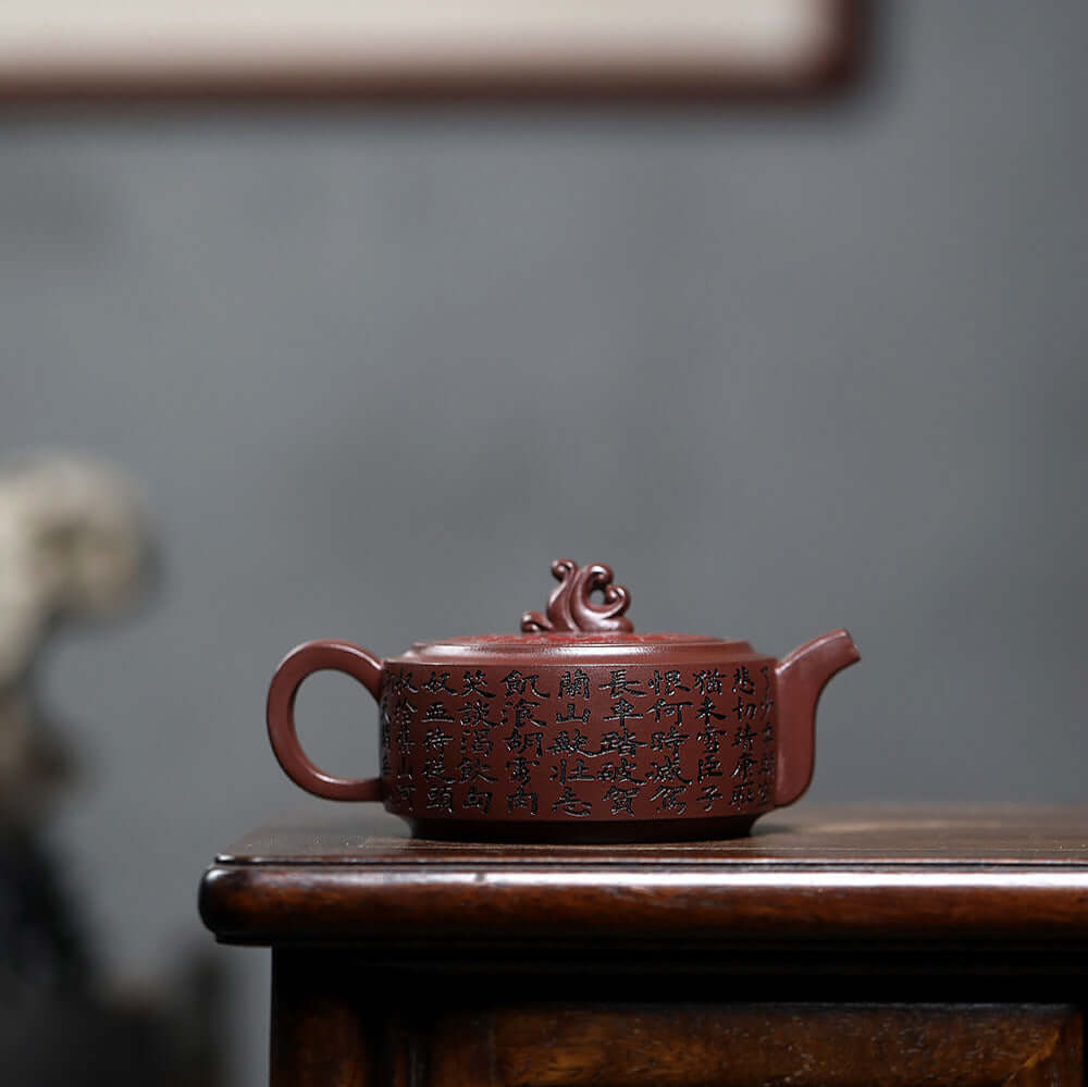 Handmade Yixing purple sand teapot featuring intricate ciphertext, perfect for kung fu tea ceremonies.