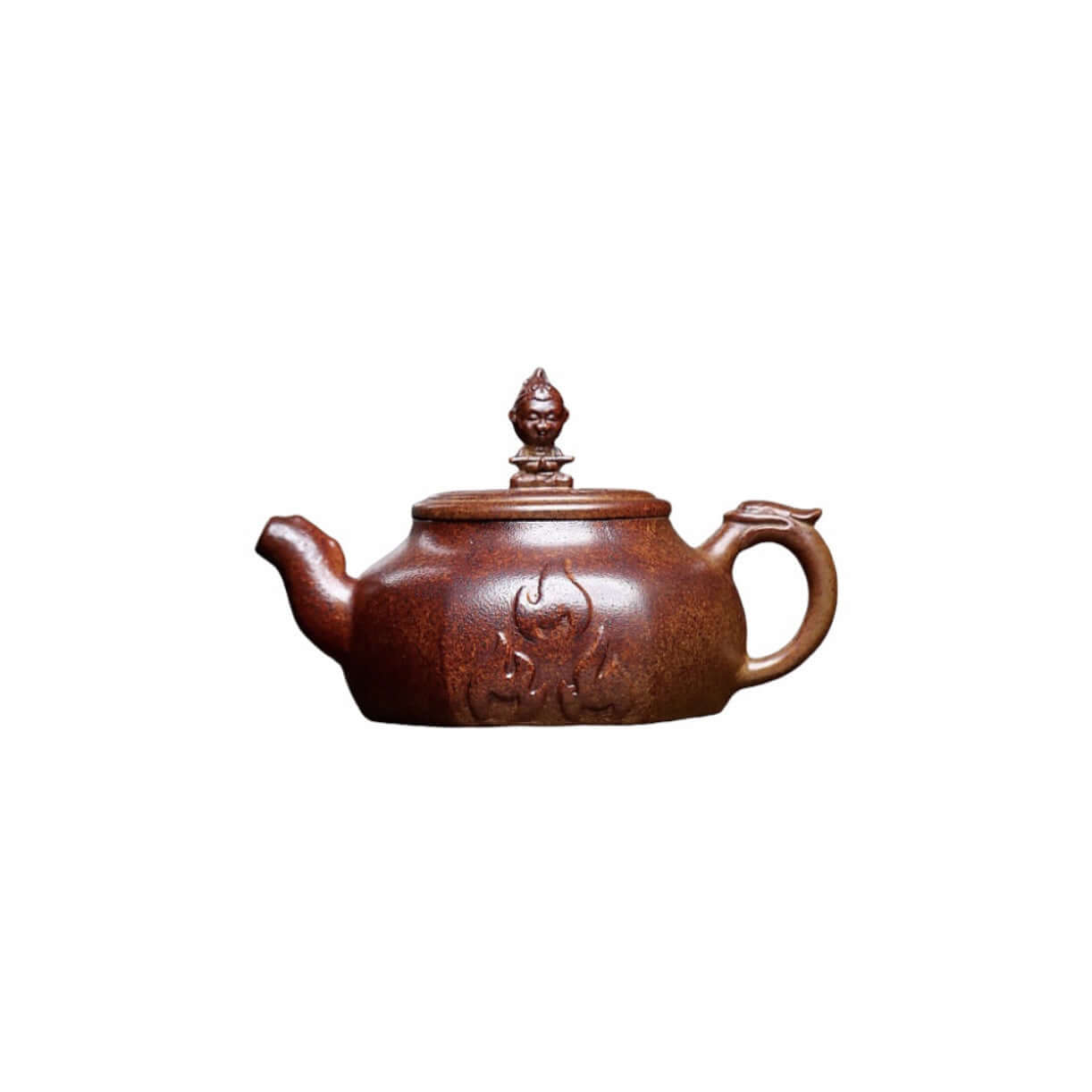 Handmade Yixing purple sand teapot with intricate design, crafted using raw ore and traditional methods.