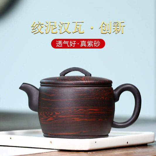 Handmade Yixing purple sand teapot with elegant design and robust construction, perfect for tea enthusiasts.