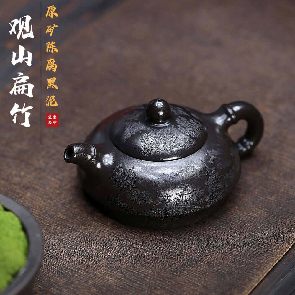 Handmade Yixing purple sand teapot with intricate design, perfect for kung fu tea sets and authentic brewing.