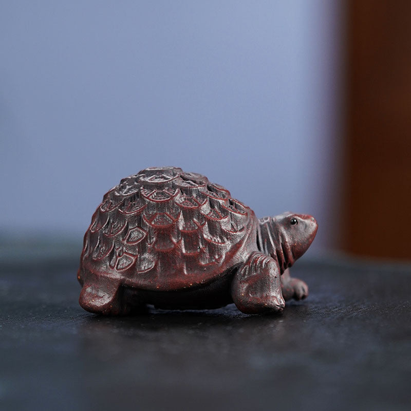 Handmade Yixing purple sand turtle ornament crafted from original purple sand for home office decoration.