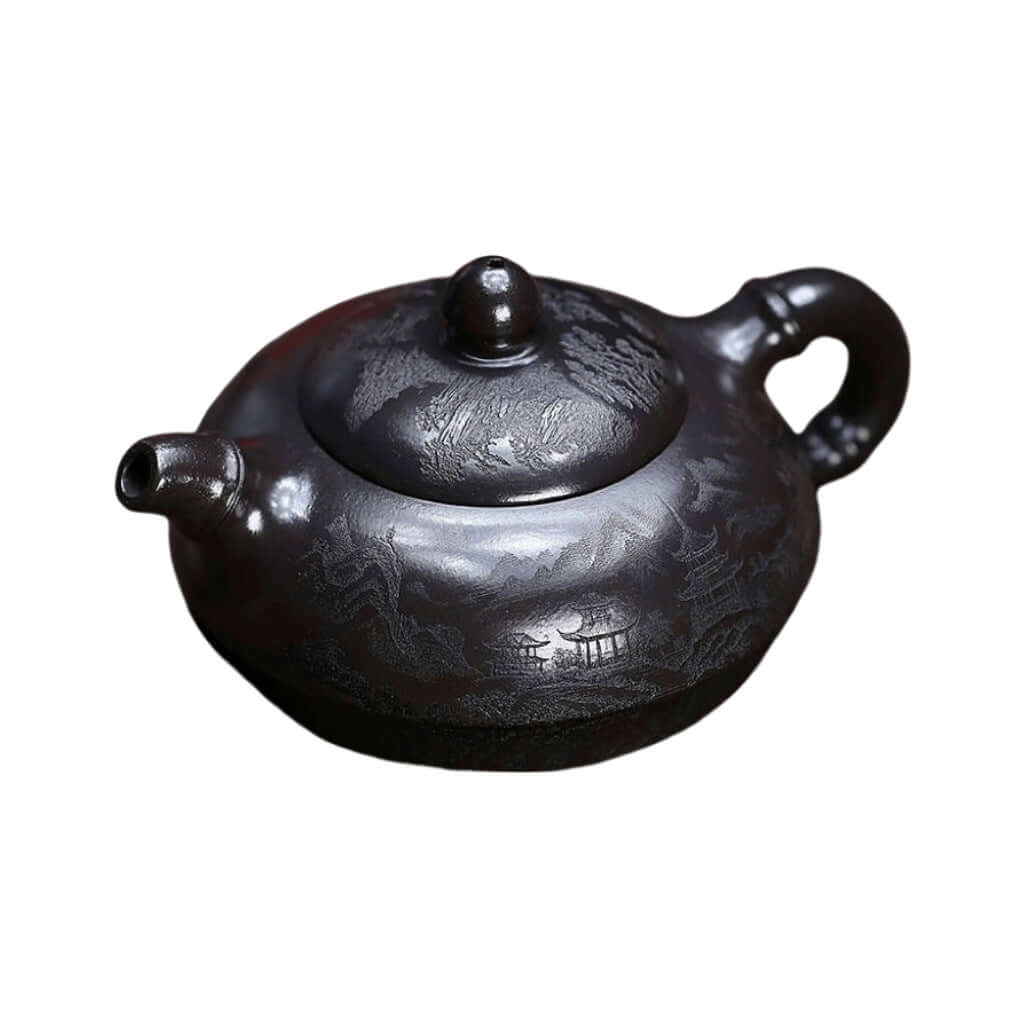 Handmade Yixing purple sand teapot featuring raw ore and mountain scenery, perfect for kung fu tea sets.