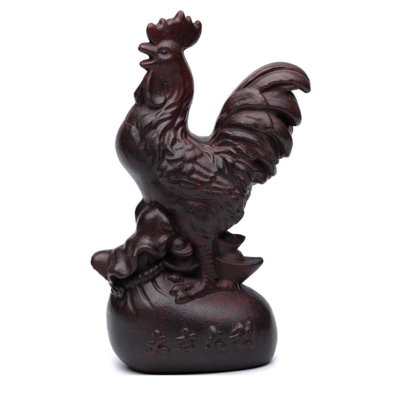 Handmade Yixing purple sand rooster tea pet ornament, symbolizing good luck and artistry in tea culture.