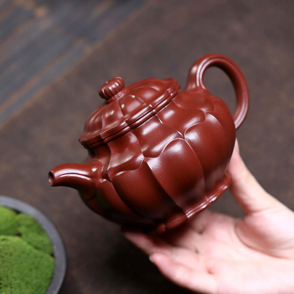 Handmade Yixing purple sand teapot with dragon rib pattern, perfect for kung fu tea set.