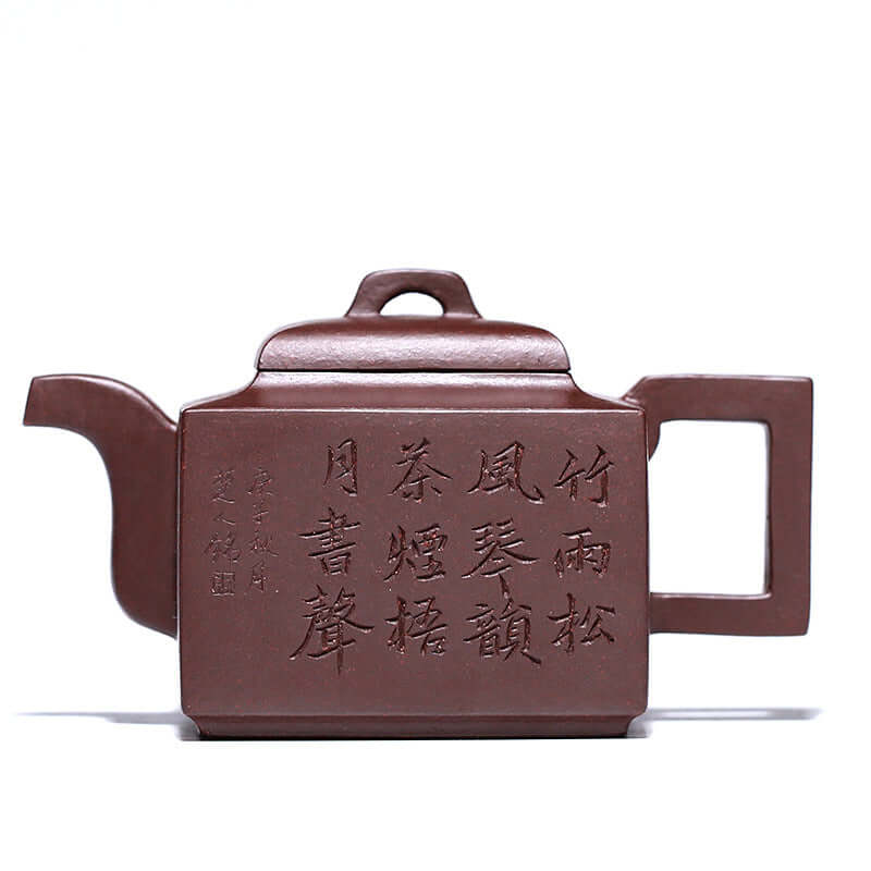 Handmade Yixing purple sand teapot with intricate designs, showcasing traditional craftsmanship and elegant shape.
