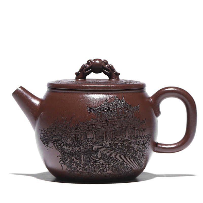 Handmade Yixing purple sand teapot featuring an intricate dragon design and a decorative lid with a unique handle.