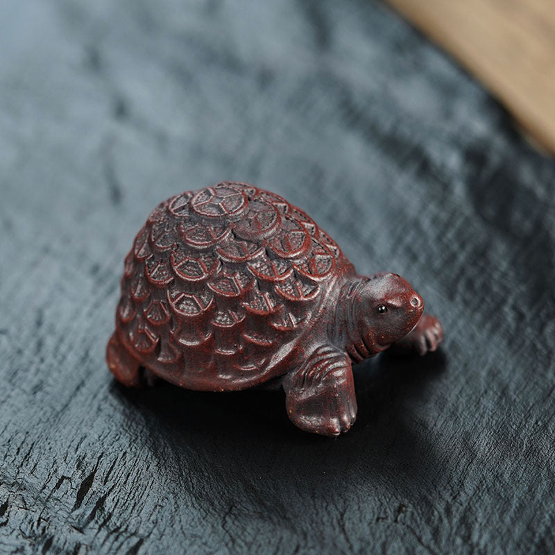 Handmade Yixing purple sand turtle ornament, crafted from original purple sand, perfect for tea pet decor.