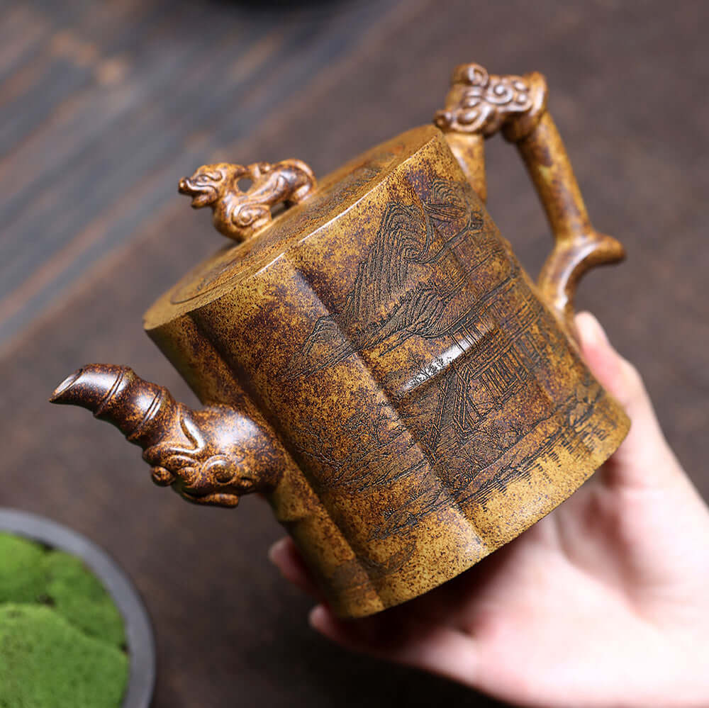 Handmade Yixing purple sand teapot with intricate design, perfect for a kung fu tea set.