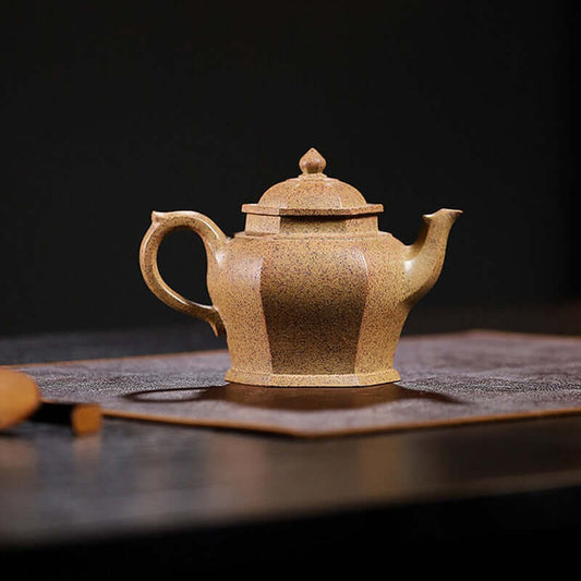 Handmade Yixing purple sand teapot, original clay, unique craftsmanship in traditional design.
