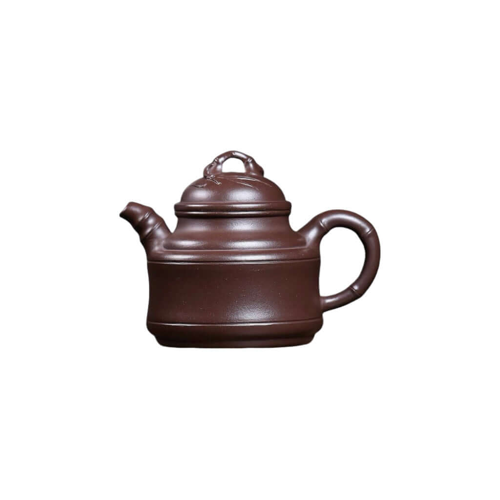Handmade Yixing purple sand teapot with bionic bamboo design, perfect for Kung Fu tea sets and home brewing.