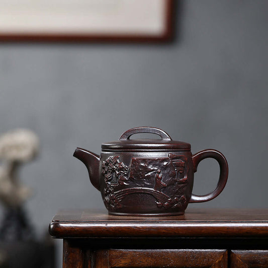Handmade Yixing purple sand teapot displaying intricate design, showcasing traditional craftsmanship and artistry.
