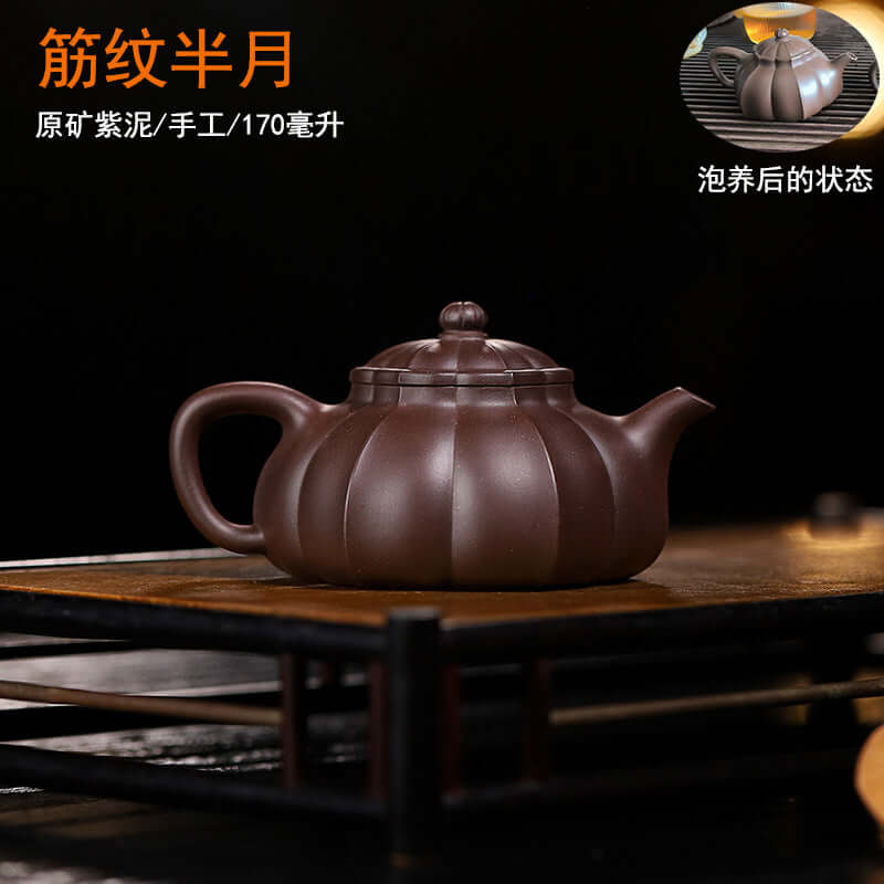 Handmade Yixing purple sand teapot with ribbed design, perfect for home tea brewing, showcasing original craftsmanship.