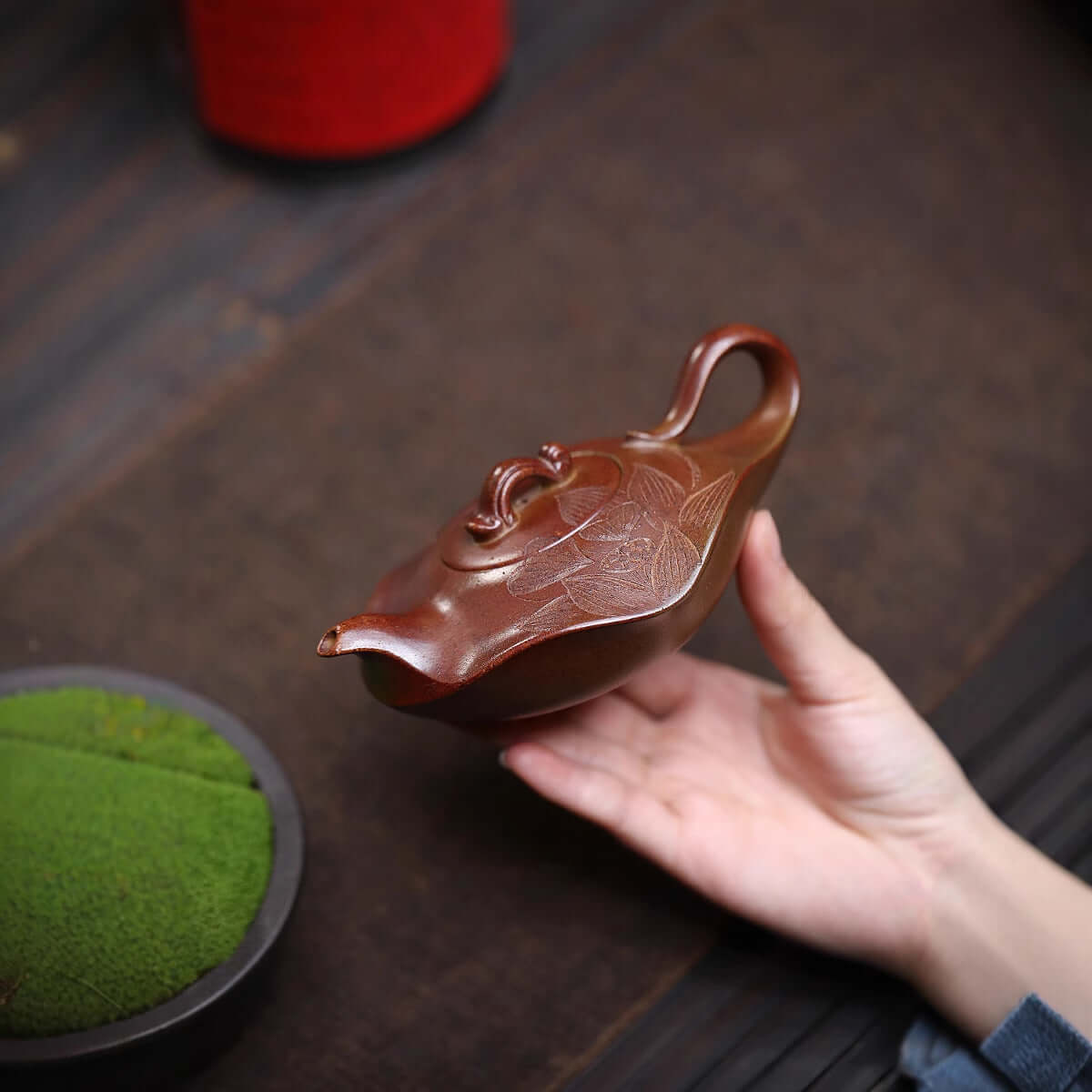 Handmade Yixing purple sand teapot with lotus design, crafted from original raw ore, perfect for household tea sets.