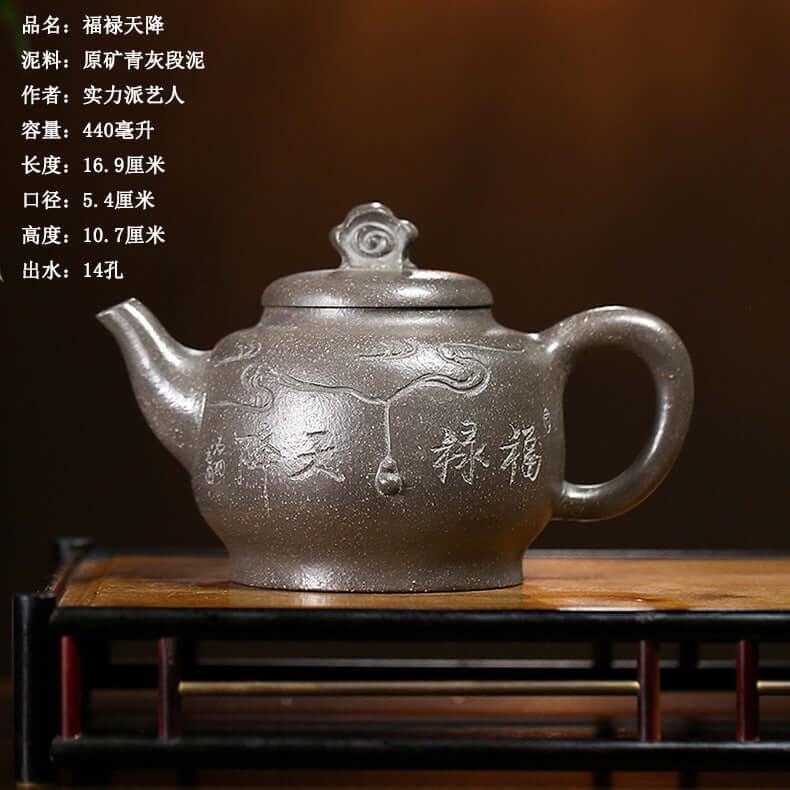 Handmade Yixing purple sand teapot with unique design, ideal for kung fu tea ceremonies and home use.