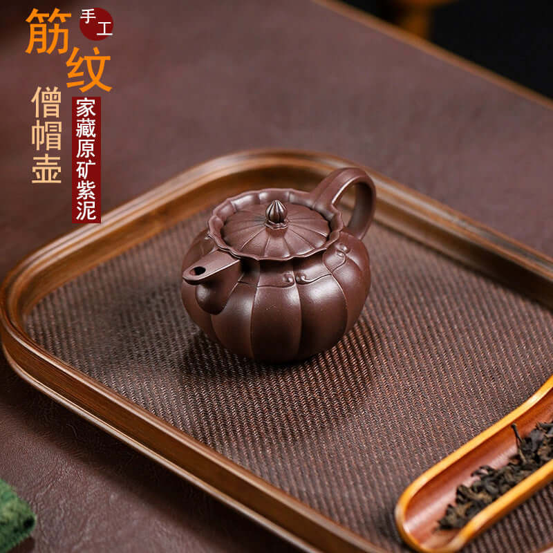 Handmade Yixing purple sand teapot with muscle pattern, featuring original purple sand, perfect for home use.