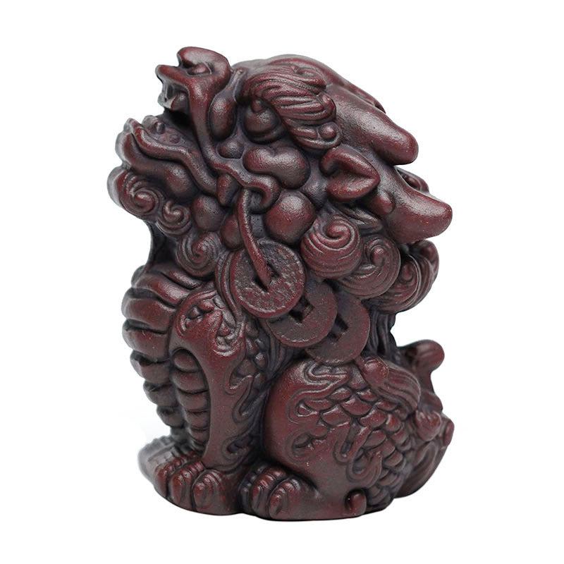 Handmade Yixing purple sand Kirin tea pet, detailed craftsmanship, portable treasure ornament for tea lovers.