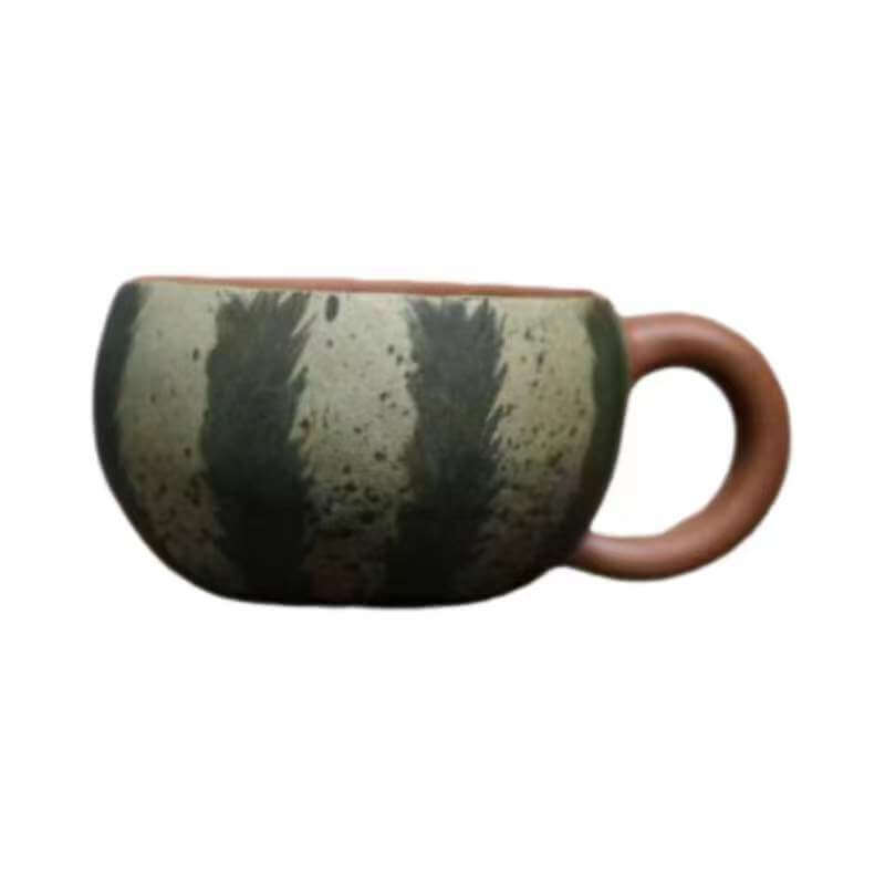Handmade Yixing purple sand cup with a unique striped design, showcasing original craftsmanship and artistry.