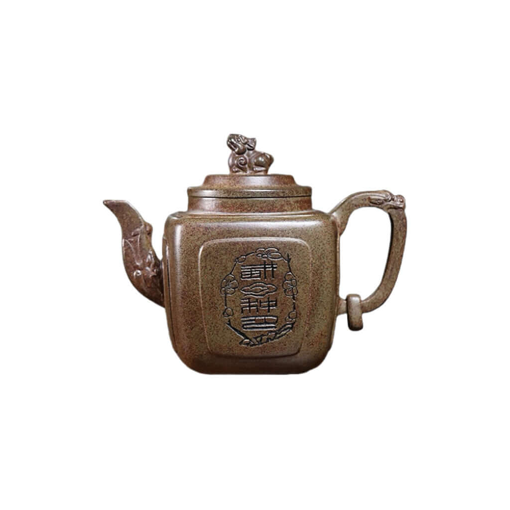 Handmade Yixing purple sand teapot with intricate design, ideal for Kung Fu tea ceremonies and tea lovers.