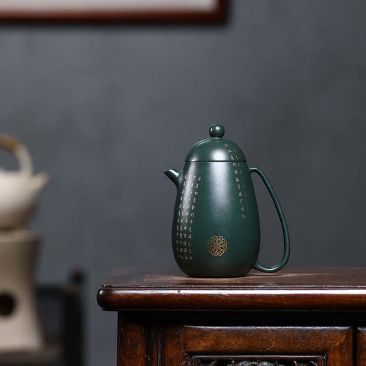 Handmade Yixing purple sand teapot in dark green with gold inscriptions, perfect for home kung fu tea sets.
