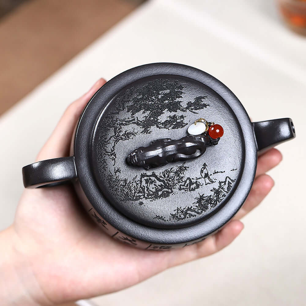 Handmade Yixing purple sand teapot with intricate design, showcasing original mineral stone craftsmanship.