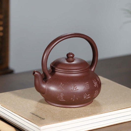 Handmade Yixing purple sand teapot with elegant design, showcasing craftsmanship, and suitable for Kung Fu tea set.