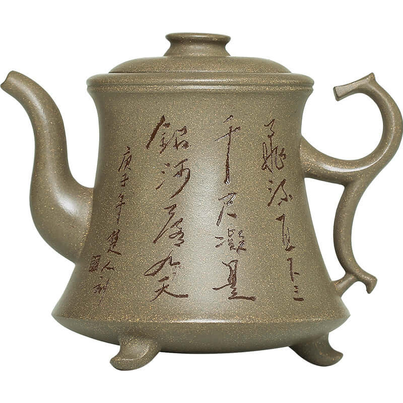 Handmade Yixing purple sand teapot with elegant lettering and unique design, showcasing fine craftsmanship.