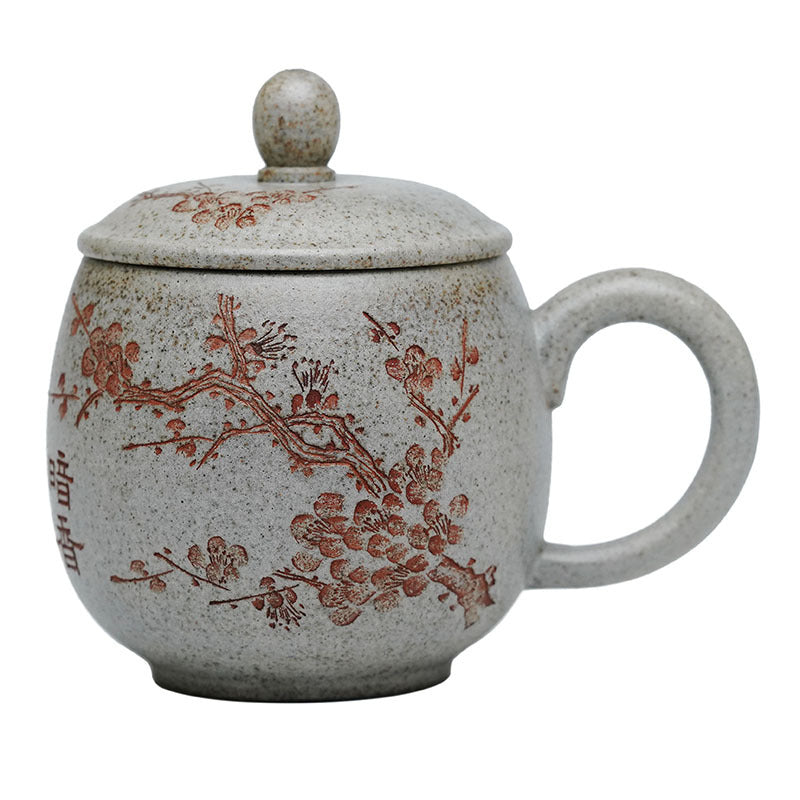 Handmade Yixing purple sand cup with plum blossom design and lid, unique original artisan craftsmanship.