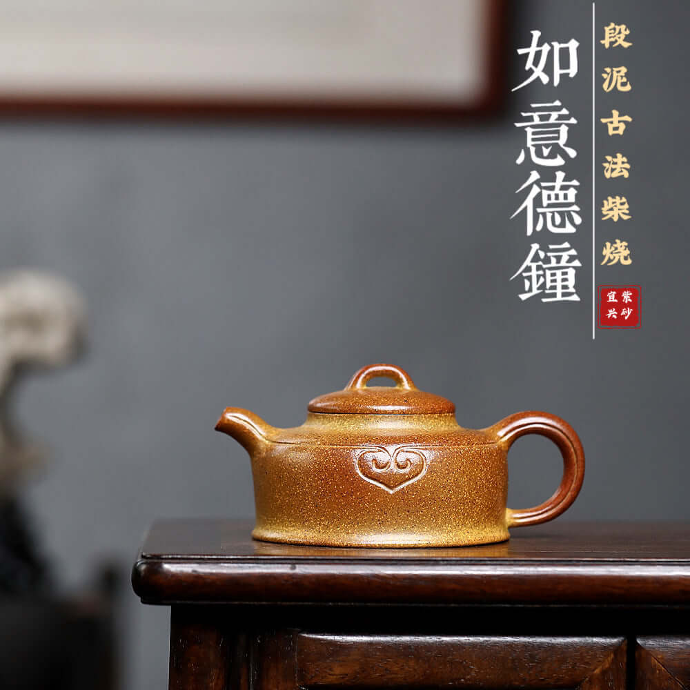 Handmade Yixing purple sand teapot, crafted from original purple clay using ancient firewood methods.