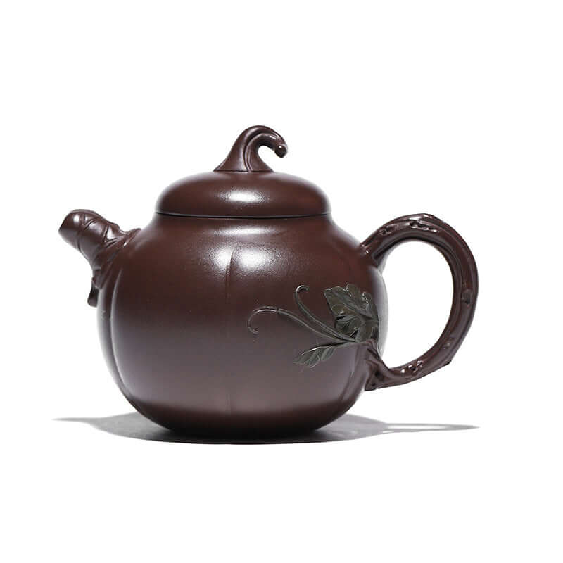 Handmade Yixing purple sand teapot with unique melon shape and leaf design, perfect for brewing aromatic teas.