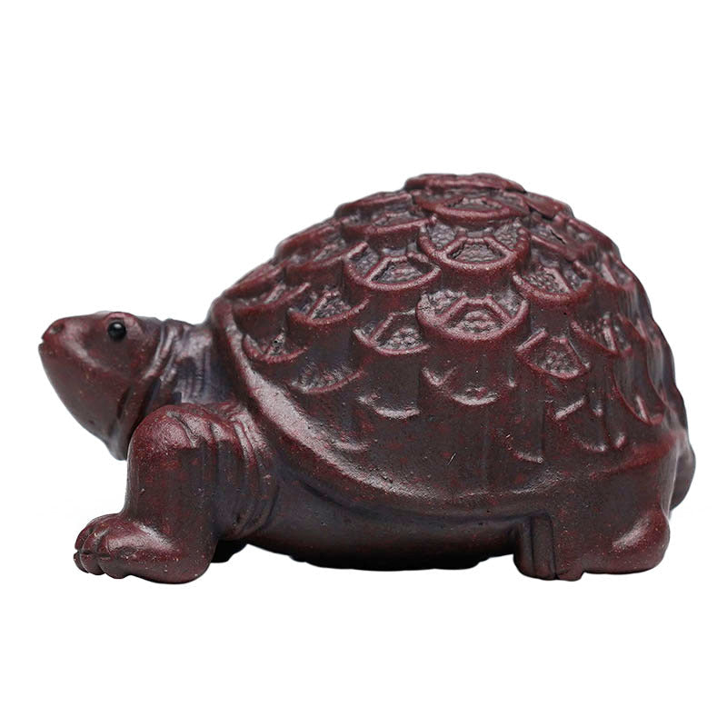Handmade Yixing purple sand golden turtle ornament, ideal for tea pet and home decoration. Unique craftsmanship in original purple sand.