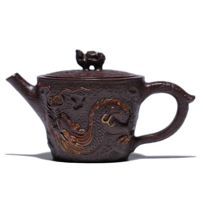 Handmade Yixing purple sand teapot featuring intricate dragon design and traditional craftsmanship.