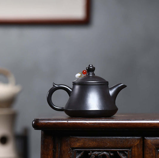 Handmade Yixing purple sand teapot designed by a master craftsman, perfect for home Kung Fu tea set.