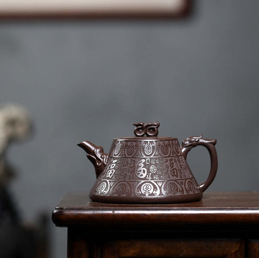 Handmade Yixing purple sand teapot with intricate design, perfect for home kung fu tea set.