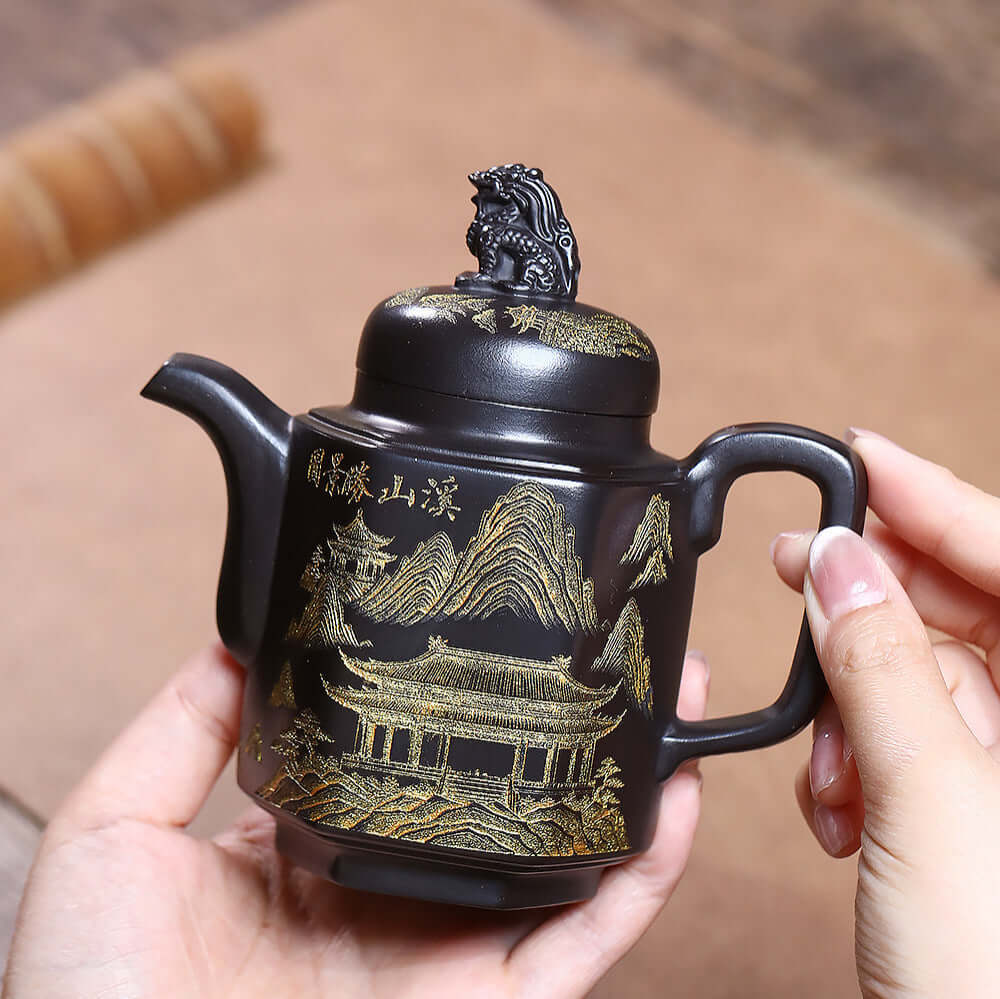 Handmade Yixing purple sand teapot featuring exquisite mountain design, ideal for home kung fu tea sets.