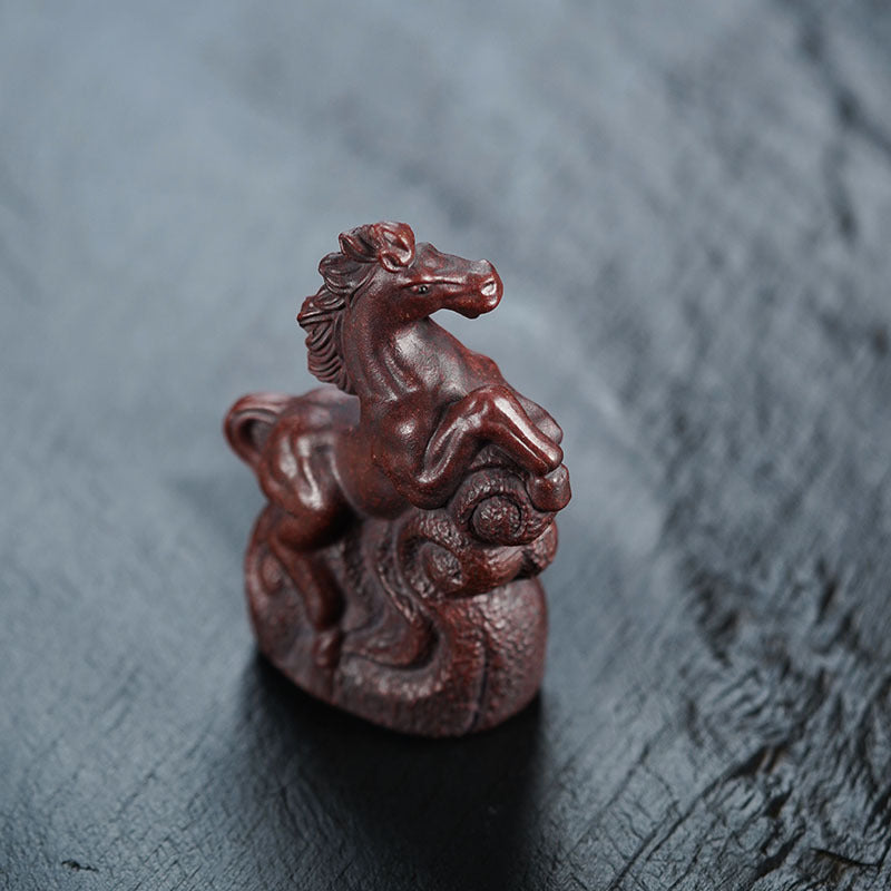 Handmade Yixing purple sand tea pet ornament, depicting a horse and dragon, perfect for tea lovers.