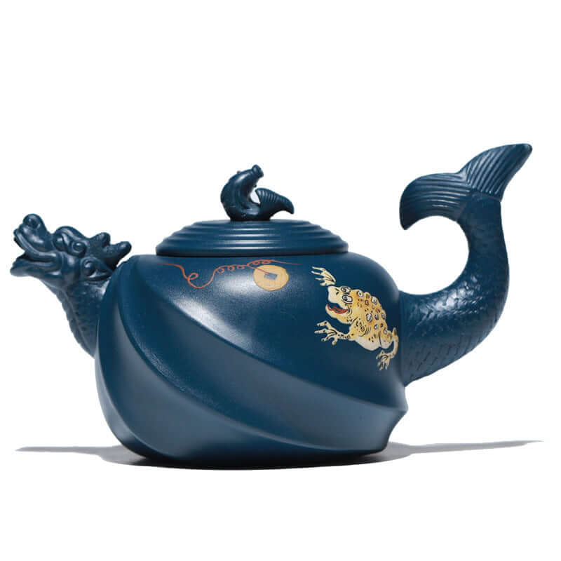 Handmade Yixing purple sand teapot with fish dragon design, showcasing intricate details and a unique shape.