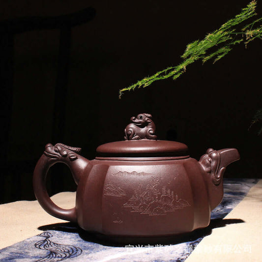 Handmade Yixing purple sand teapot with intricate design, showcasing traditional craftsmanship and elegance.